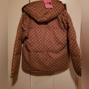 GUCCI JACKET FOR THE WINTER, IN GOOD CONDITION, BROWN AND TAN COLOR.